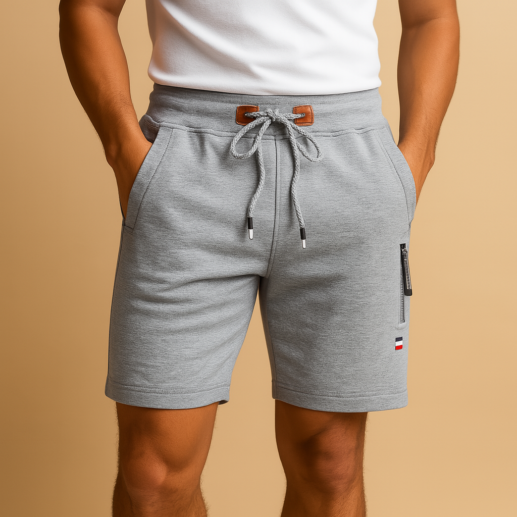 Men’s breathable athletic shorts with elastic waistband and multiple pockets, perfect for travel, workouts, and casual outdoor activities.