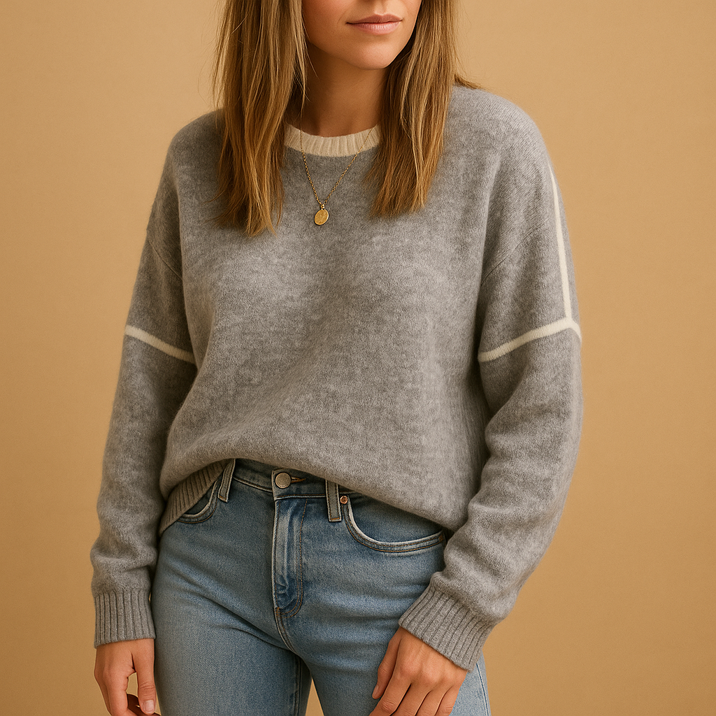 Classic round-neck knitted women’s sweater with long sleeves, soft wrinkle-free texture, and timeless design for all-season wear.