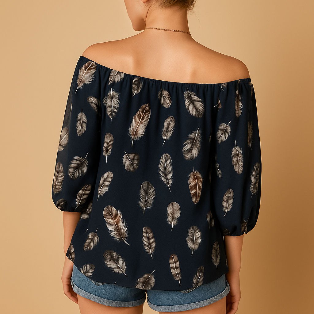 Women’s feather print V-neck blouse with relaxed fit and breathable fabric, perfect for warm days and casual outfits.
