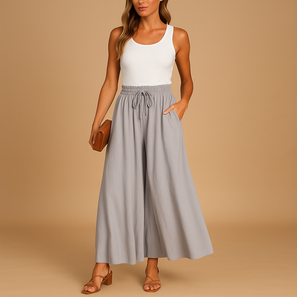 Women’s high waisted wide leg pants with elastic waistband, designed for a chic and flattering fit, perfect for work, casual outings, or elegant occasions.