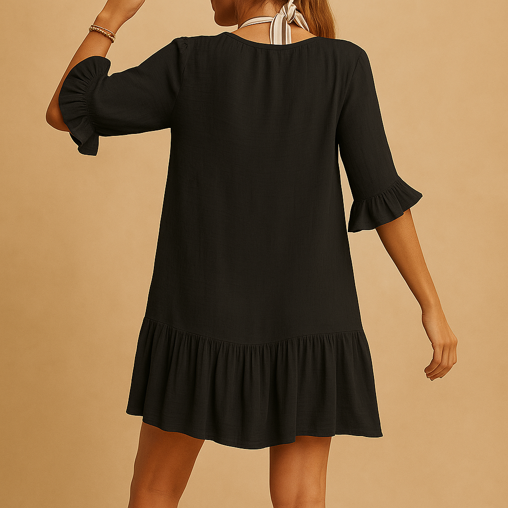 Women’s light summer dress with loose fit and soft, breathable fabric, ideal for warm days, beach trips, and casual summer wear.