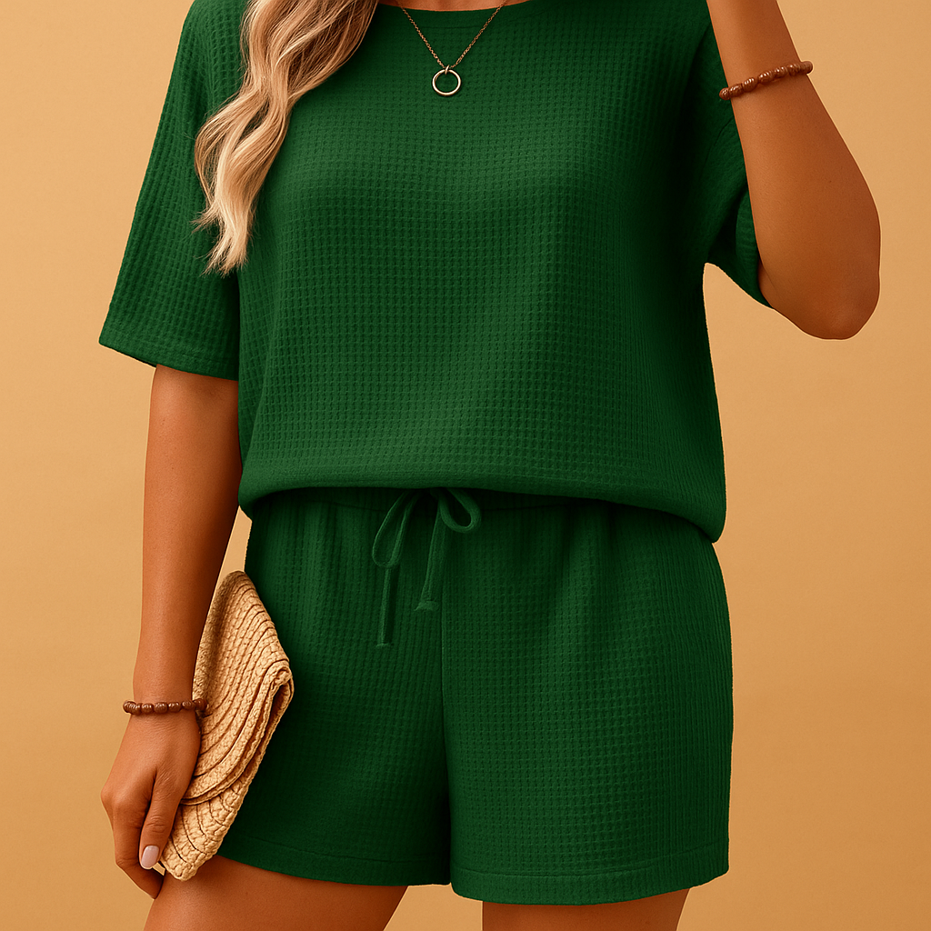 Women’s lightweight loungewear set with round-neck top and shorts, perfect for home relaxation and casual summer wear.