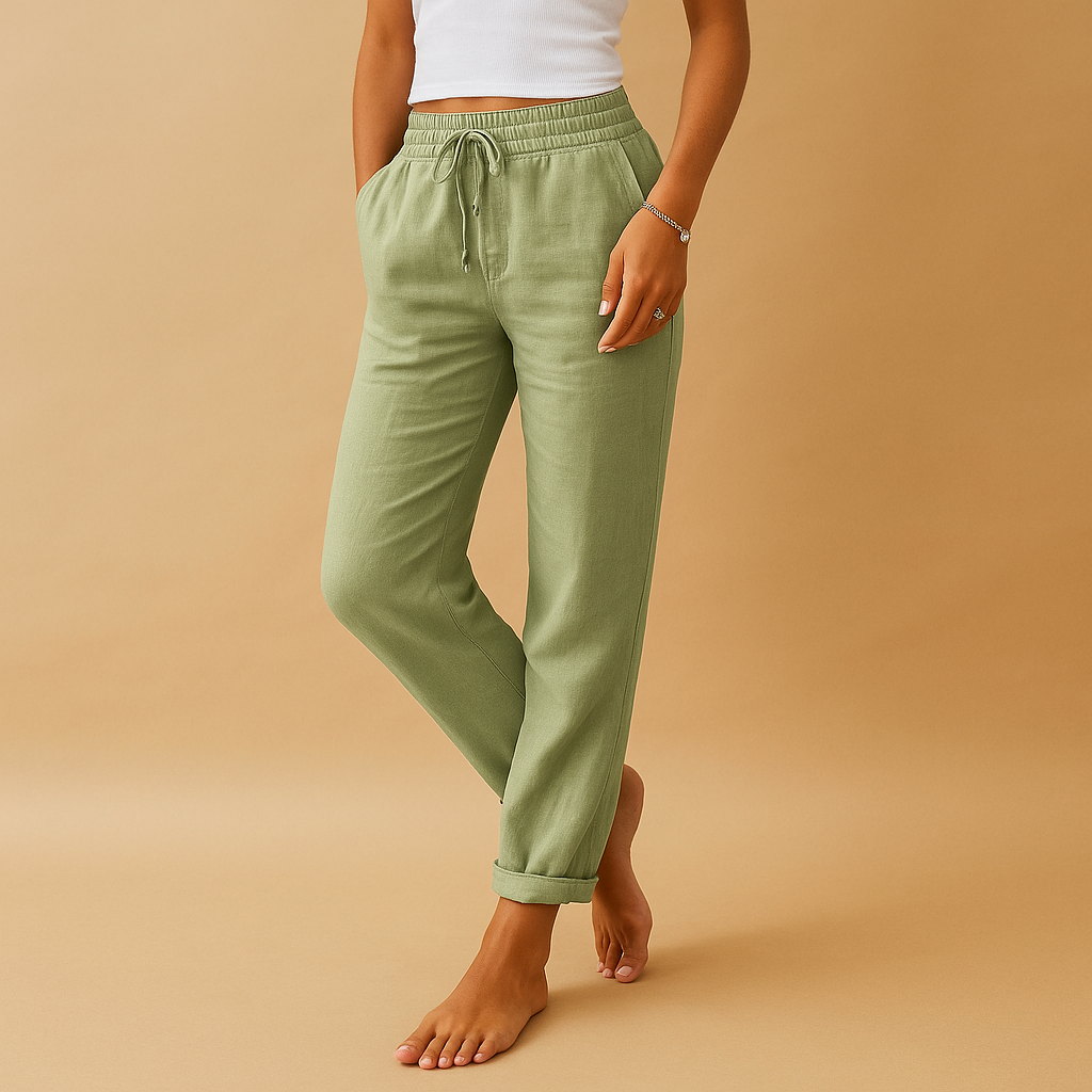 Women’s lightweight trousers with elastic waistband and feminine cut, designed with flowy fabric for both casual wear and formal occasions.