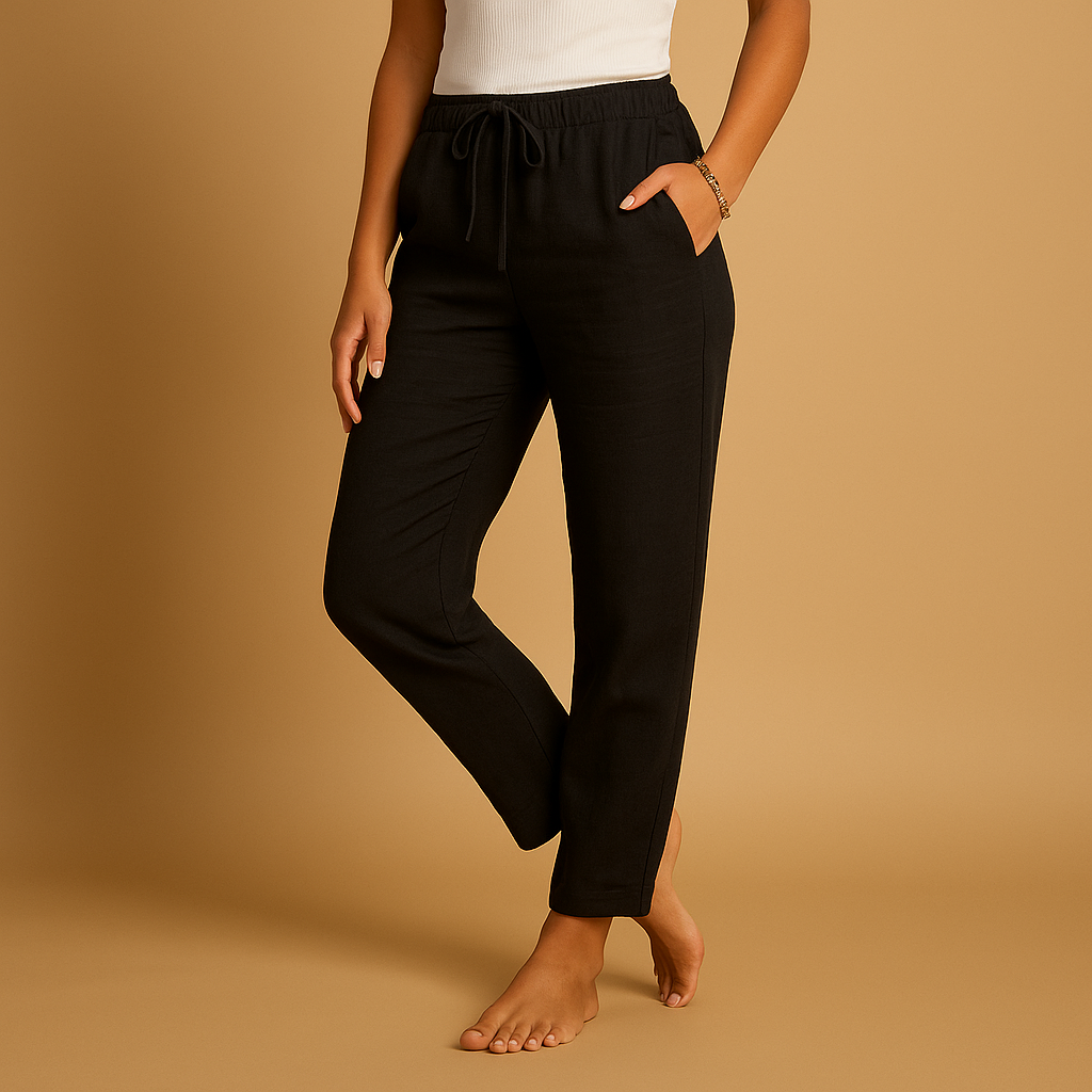 Women’s lightweight trousers with elastic waistband and feminine cut, designed with flowy fabric for both casual wear and formal occasions.