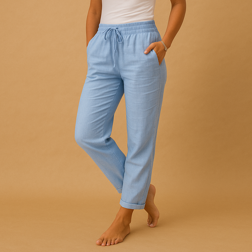 Women’s lightweight trousers with elastic waistband and feminine cut, designed with flowy fabric for both casual wear and formal occasions.