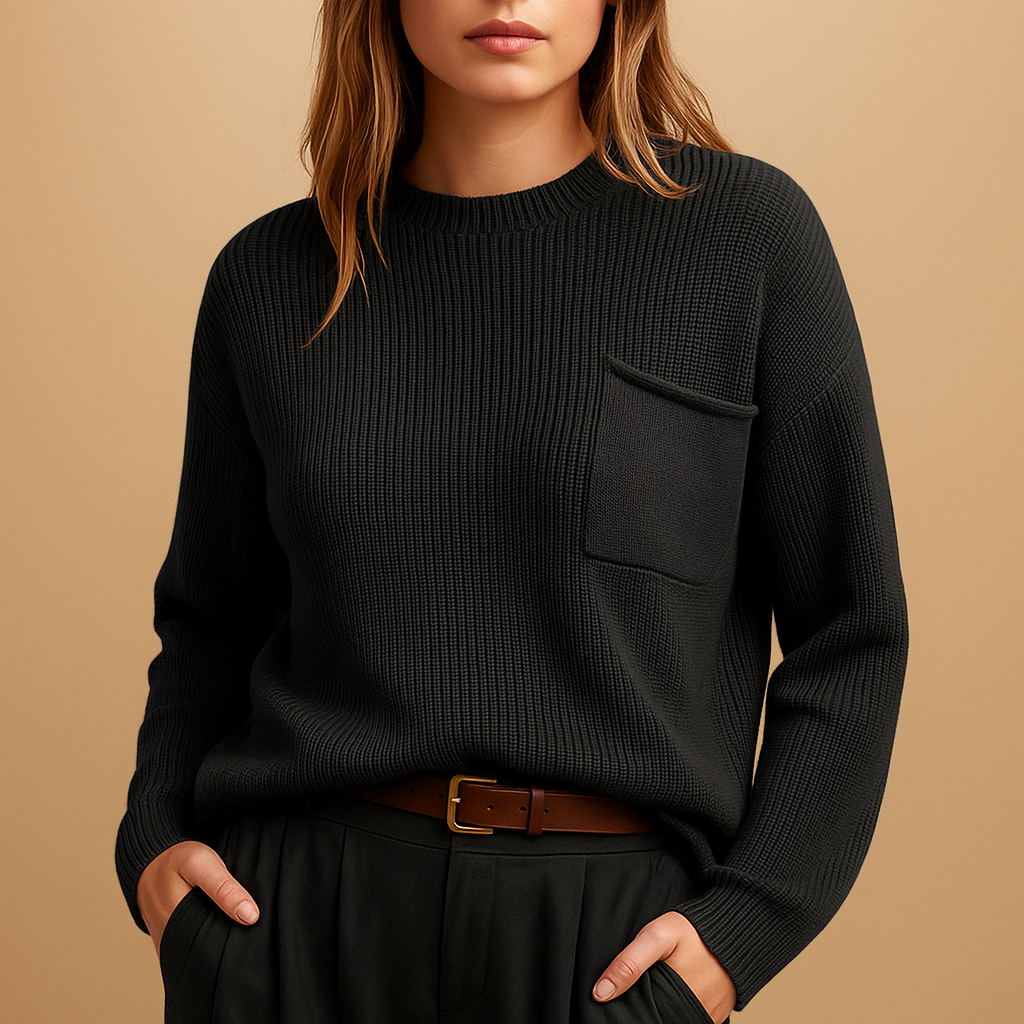 Minimalist women’s knitted sweater with a relaxed fit and clean silhouette, ideal for everyday outfits and semi-formal occasions.