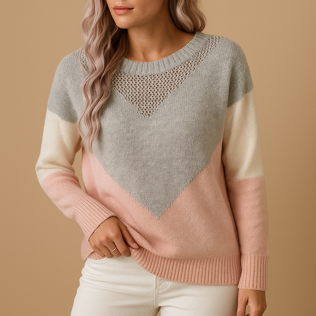 Relaxed-fit knitted women’s sweater in soft neutral tones with a minimalistic design, ideal for layering, casual wear, and cozy everyday outfits.