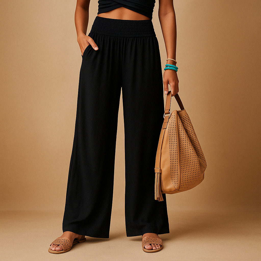 Women’s breathable summer trousers with elastic waistband and loose straight legs, perfect for warm weather, casual outings, or relaxed days at home.