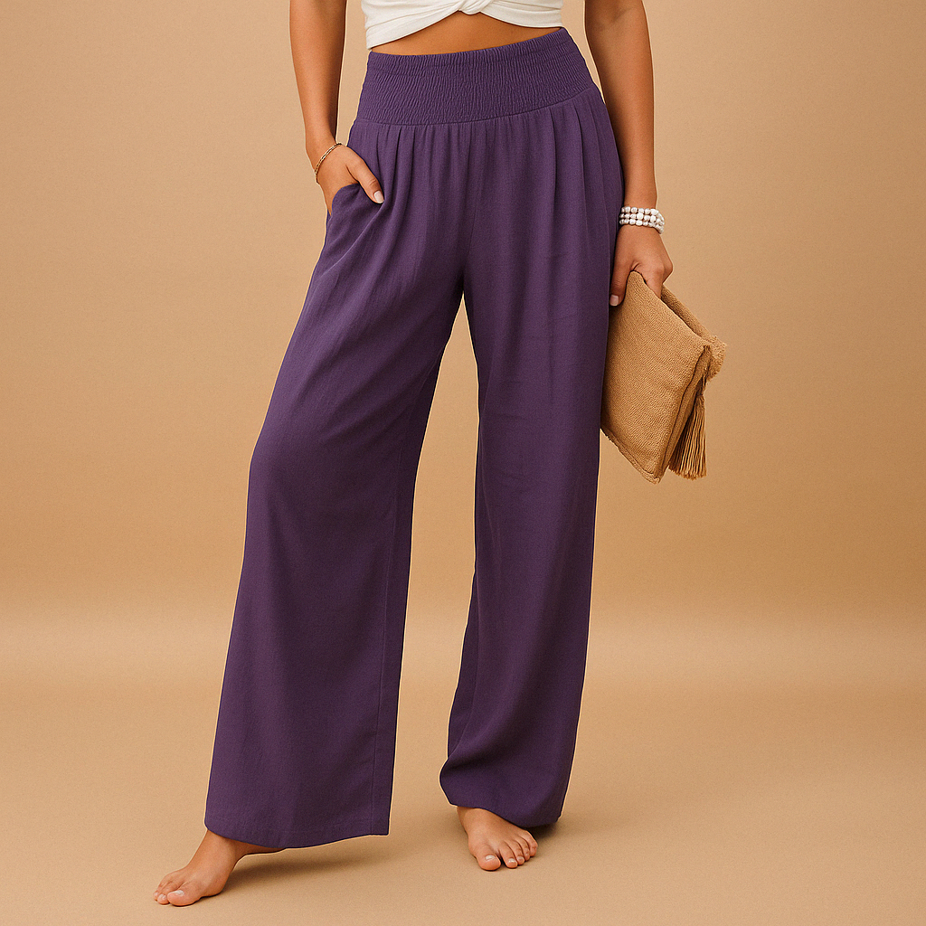 Women’s breathable summer trousers with elastic waistband and loose straight legs, perfect for warm weather, casual outings, or relaxed days at home.