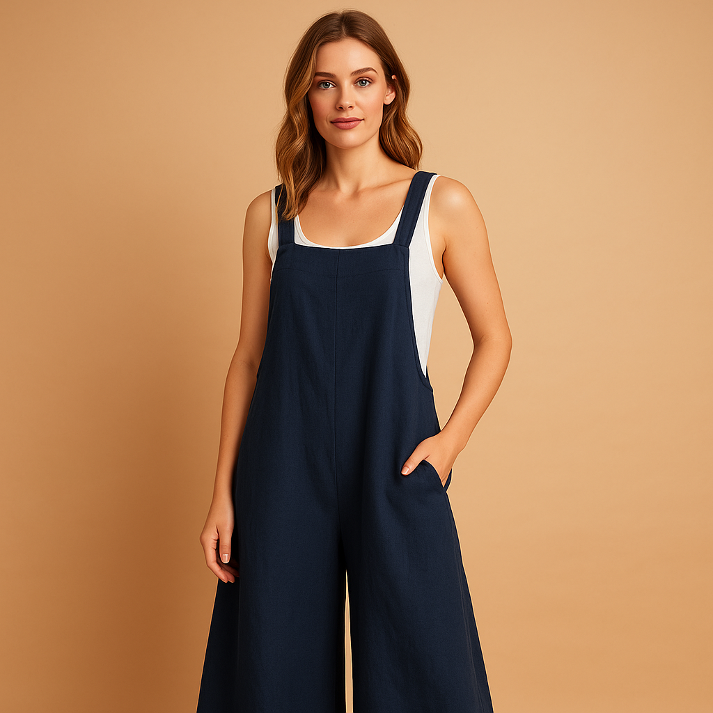 Elegant wide-leg cotton linen jumpsuit for women in neutral tones with a loose fit, ideal for summer days, lounging, or casual outings.