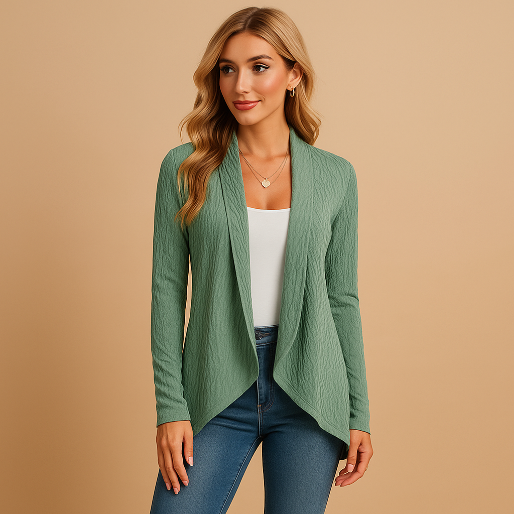 Long knitted cardigan for women in soft solid-colored knit with a relaxed fit, perfect for layering in autumn and spring outfits.