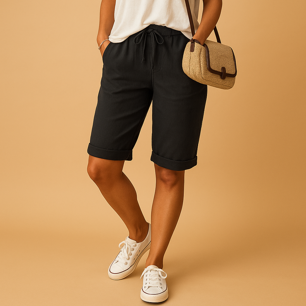 Women’s casual capri pants with relaxed fit, elastic waistband, drawstring, and rolled hem design, perfect for spring and summer wear.
