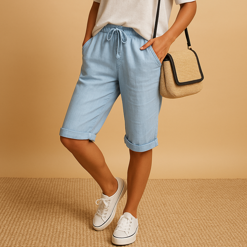 Women’s casual capri pants with relaxed fit, elastic waistband, drawstring, and rolled hem design, perfect for spring and summer wear.