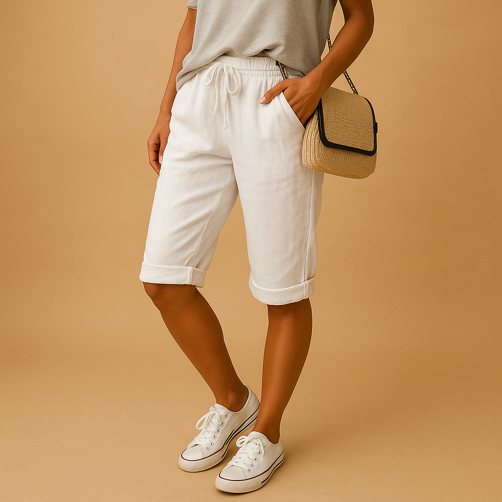 Women’s casual capri pants with relaxed fit, elastic waistband, drawstring, and rolled hem design, perfect for spring and summer wear.