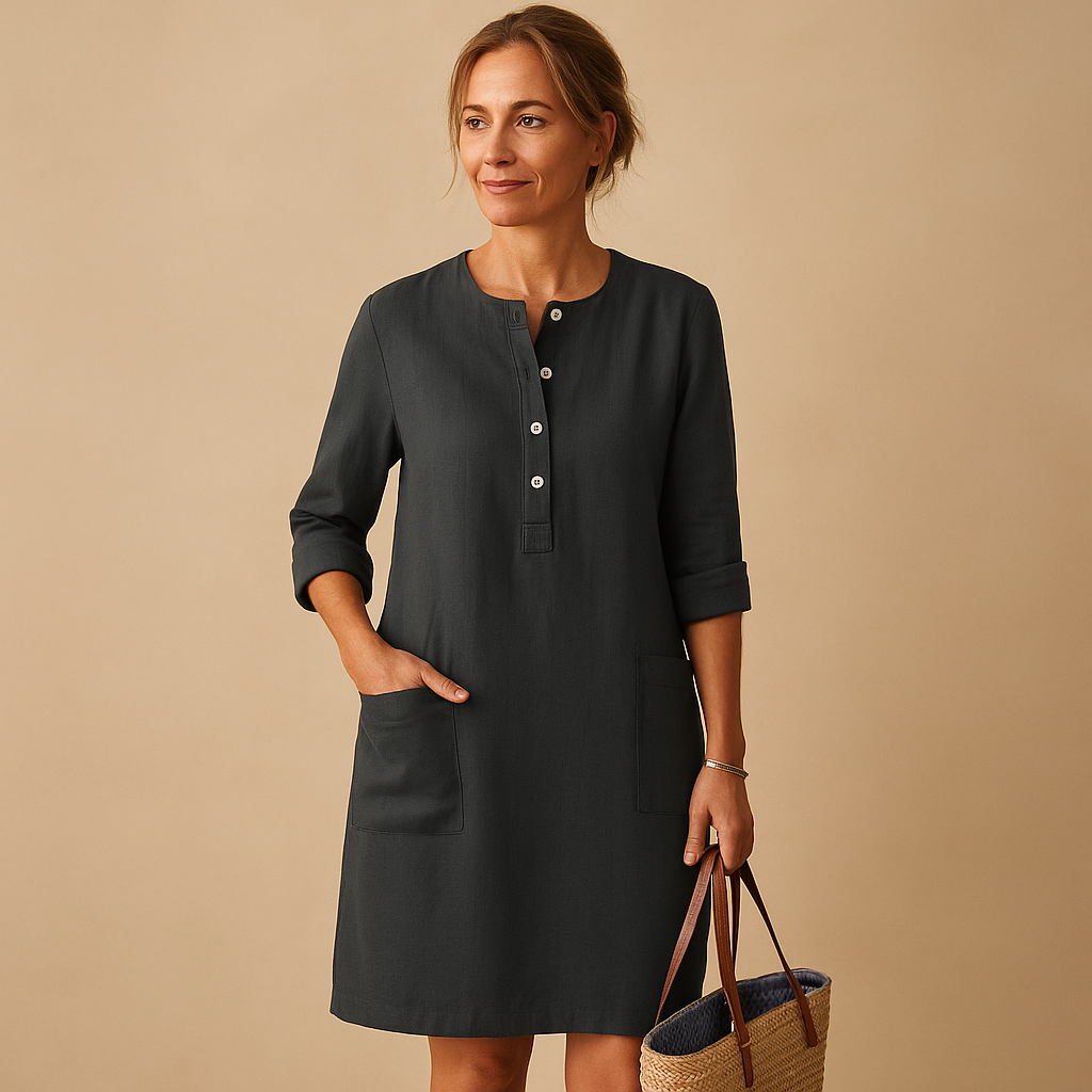 Casual long dress for women with a relaxed fit, button-down design, and rolled sleeves, perfect for everyday wear.
