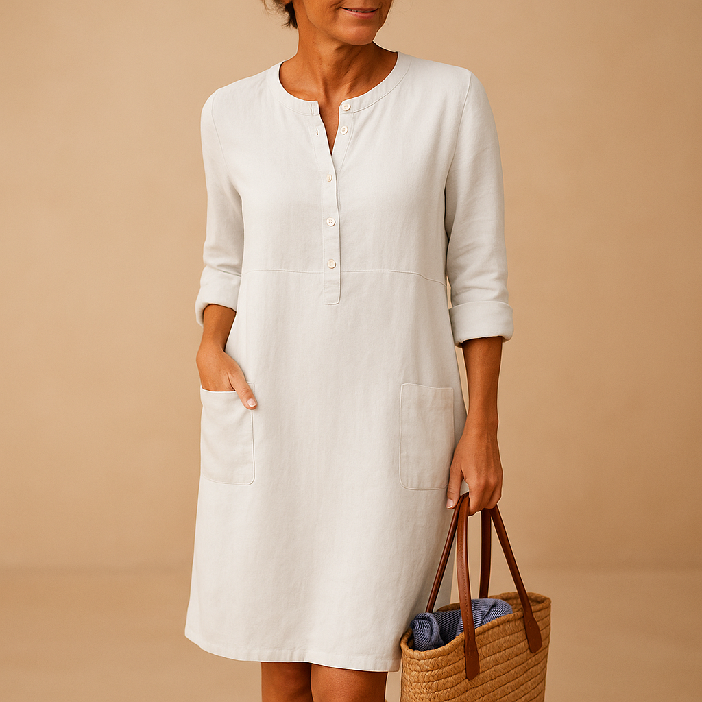 Casual long dress for women with a relaxed fit, button-down design, and rolled sleeves, perfect for everyday wear.