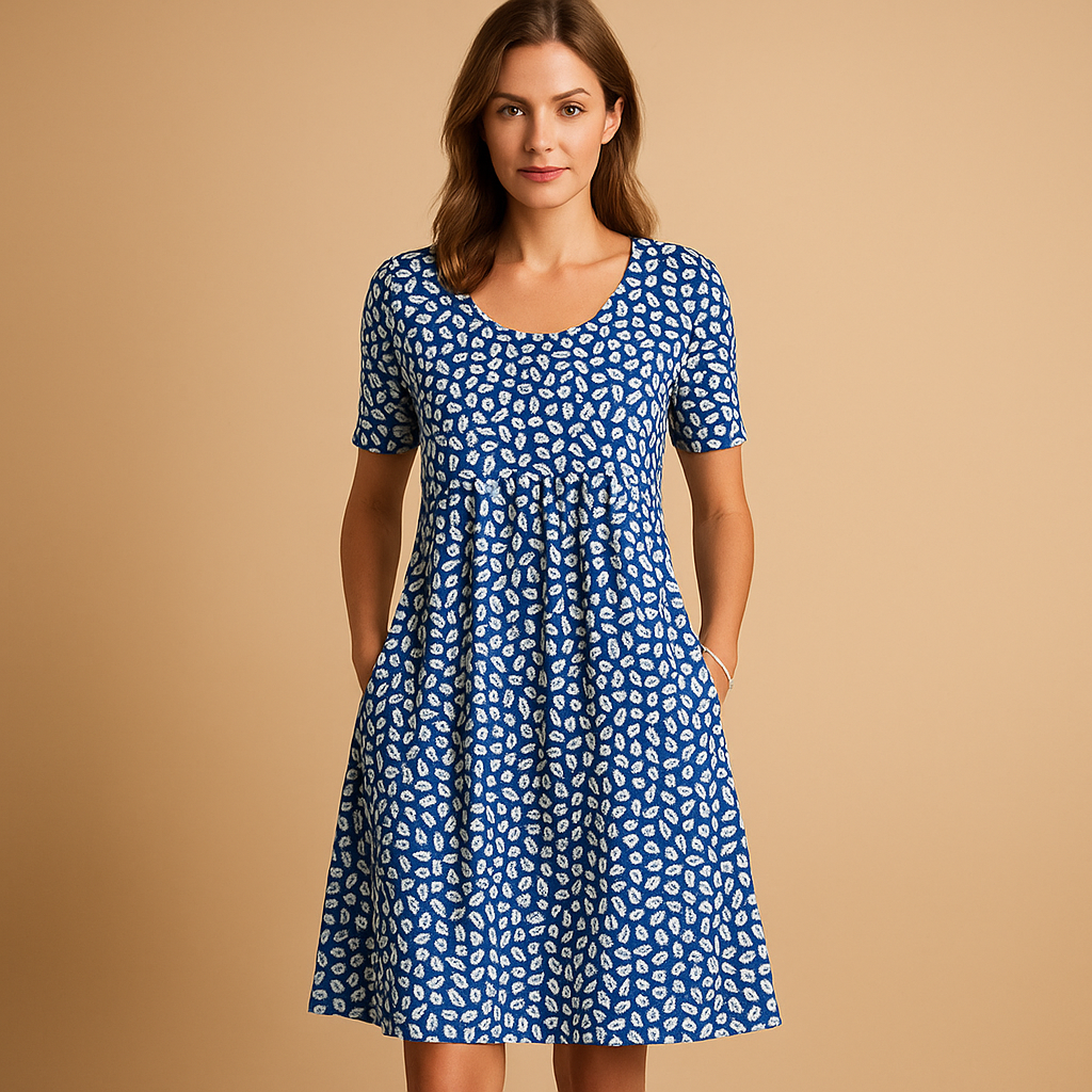 Women’s cotton printed midi dress with flattering fit and playful summer prints, perfect for holidays, city days, and casual outings.