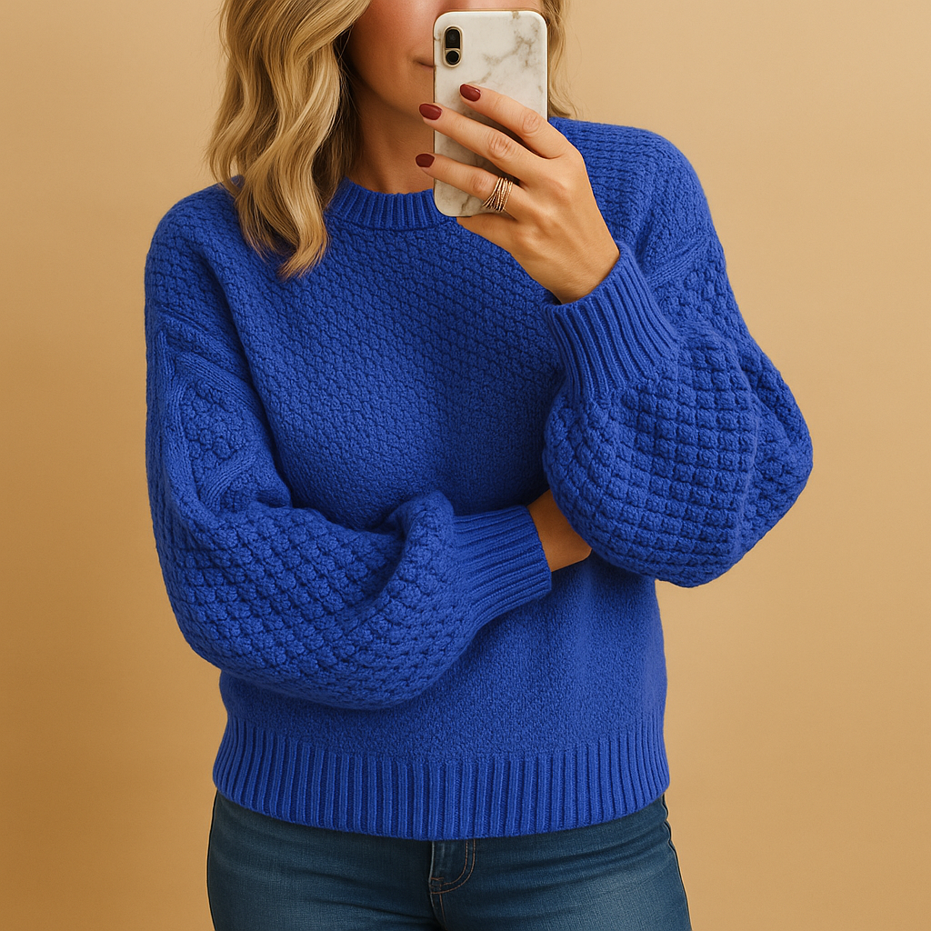 Elegant knitted sweater for women in warm tones, designed with a timeless fit. Perfect for autumn and winter casual or formal looks.