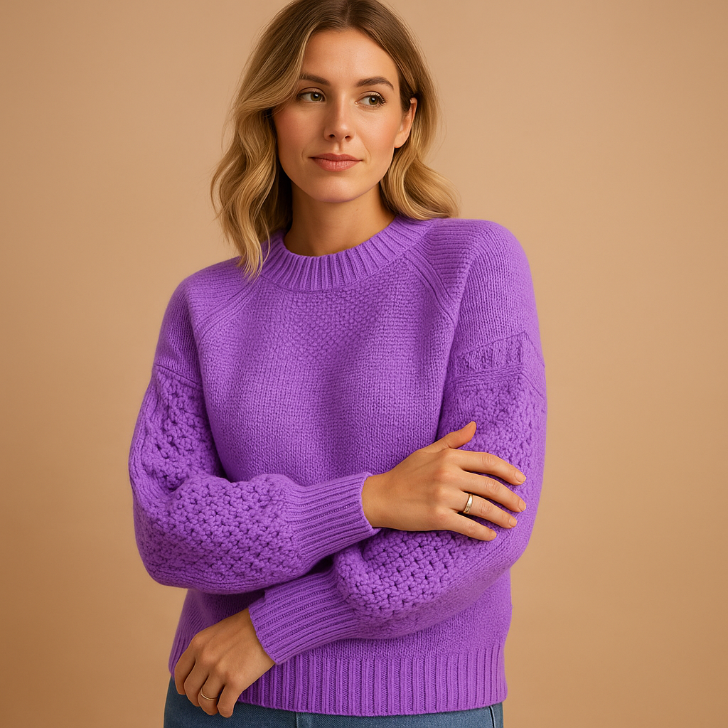 Women’s elegant knitted sweater with round neckline, long sleeves, and breathable fabric. Ideal for casual wear, office, or evening occasions.