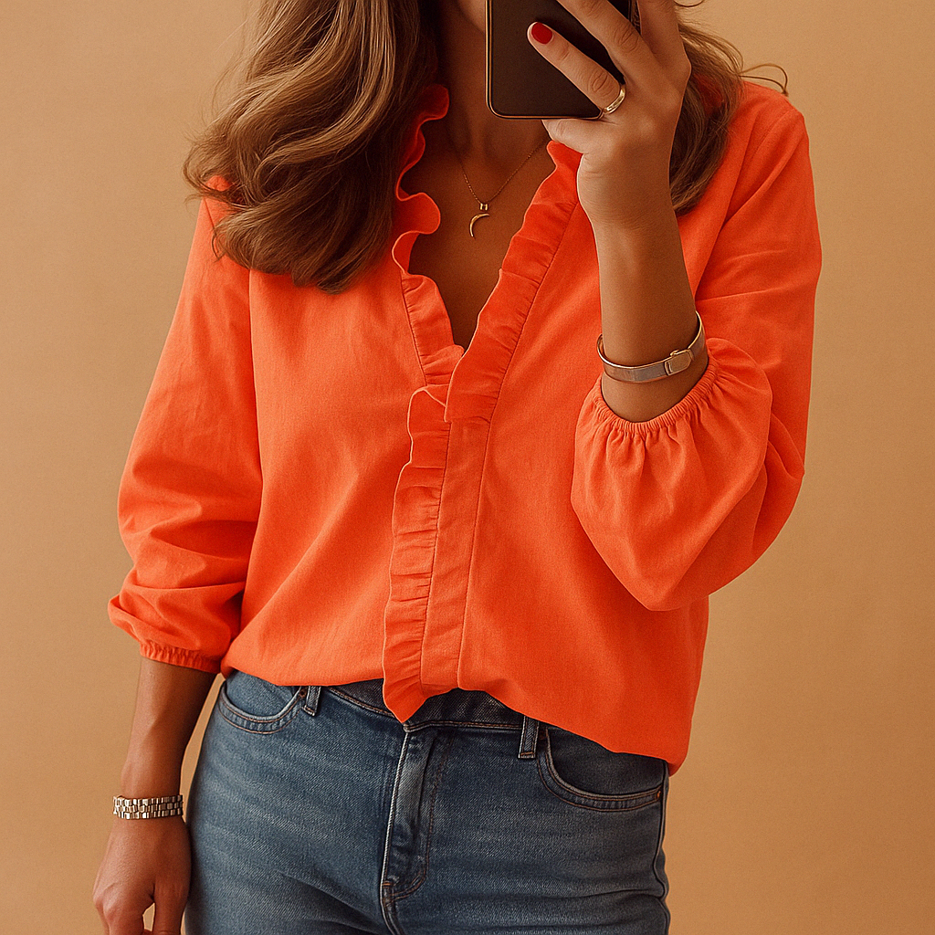 Women’s elegant blouse with ruffles, flattering fit, perfect for business and casual looks.