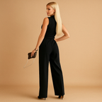 Women’s elegant wrap jumpsuit with wide-leg silhouette and tailored fit, perfect for formal occasions, work events, or stylish evenings.