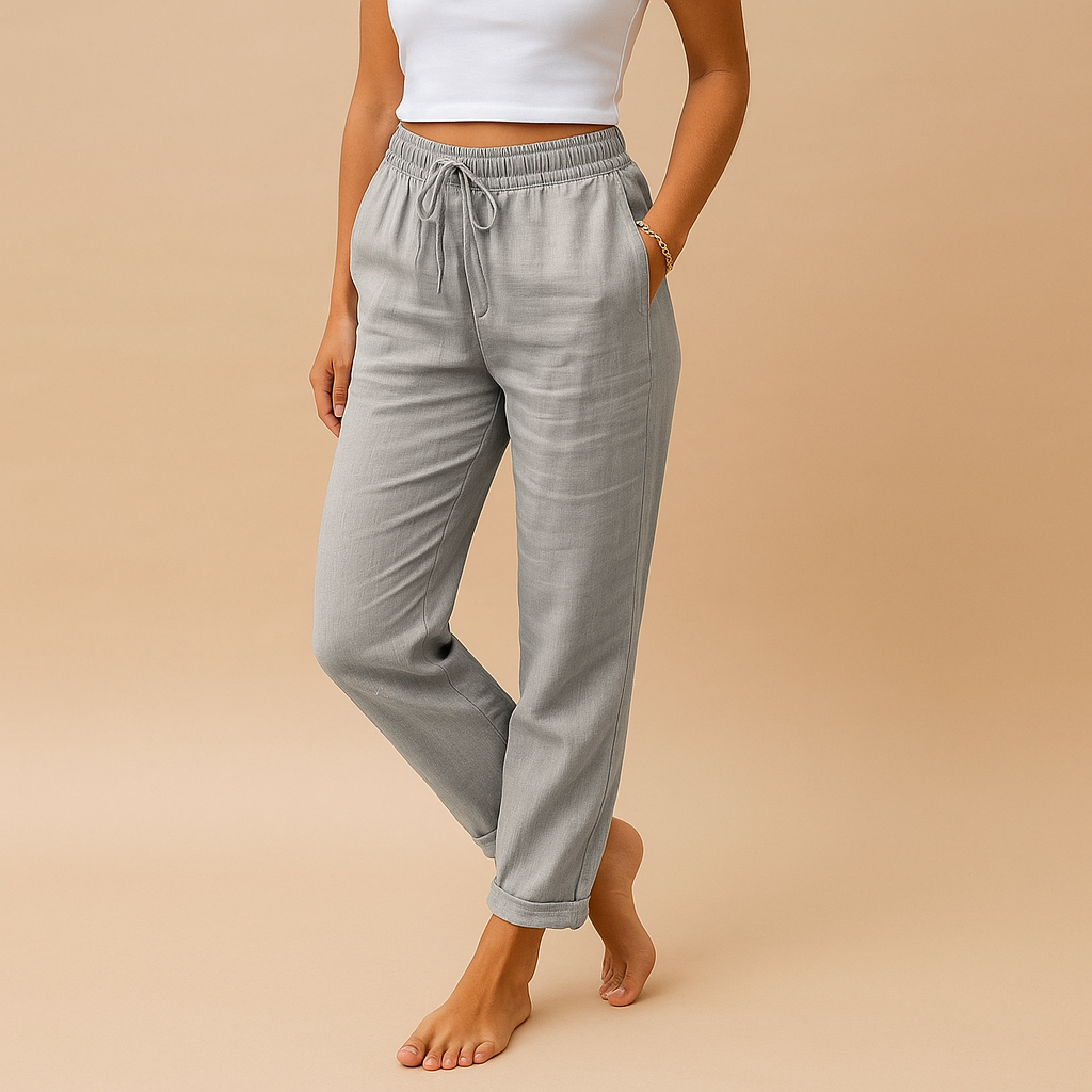 Women’s lightweight trousers with elastic waistband and feminine cut, designed with flowy fabric for both casual wear and formal occasions.