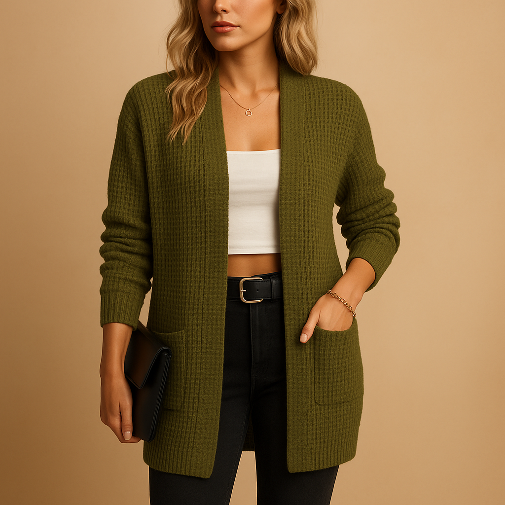 Women’s long cardigan with v-neck, relaxed fit, and practical pockets. Made from soft breathable fabric, ideal for autumn, winter, or casual everyday wear.