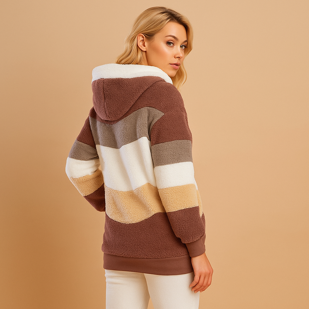 Women’s long warm winter coat with soft texture and relaxed fit, ideal for cold seasons and everyday wear.