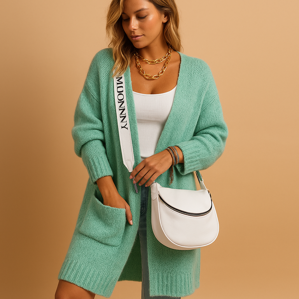 Oversized open-front cardigan for women with a light flowing fabric and elegant detailing, ideal for stylish layering and everyday comfort.