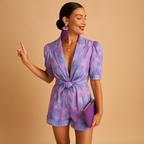 Women’s short summer jumpsuit with waist belt and colorful print, perfect for warm days, weekend fun, or summer evenings.