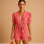 Women’s short summer jumpsuit with waist belt and colorful print, perfect for warm days, weekend fun, or summer evenings.