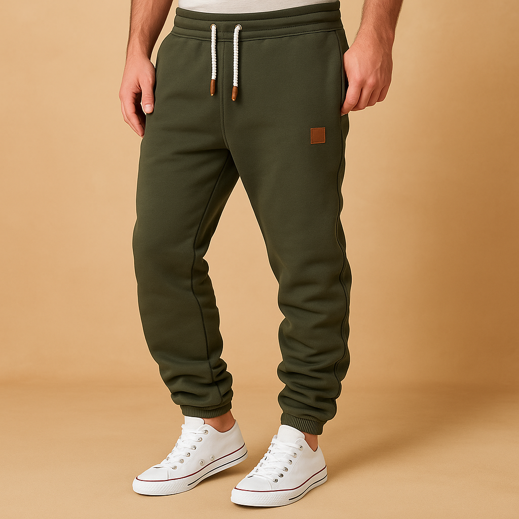 Men’s stylish jogger pants made from soft cotton blend with adjustable waistband and side pockets, ideal for workouts or casual wear.