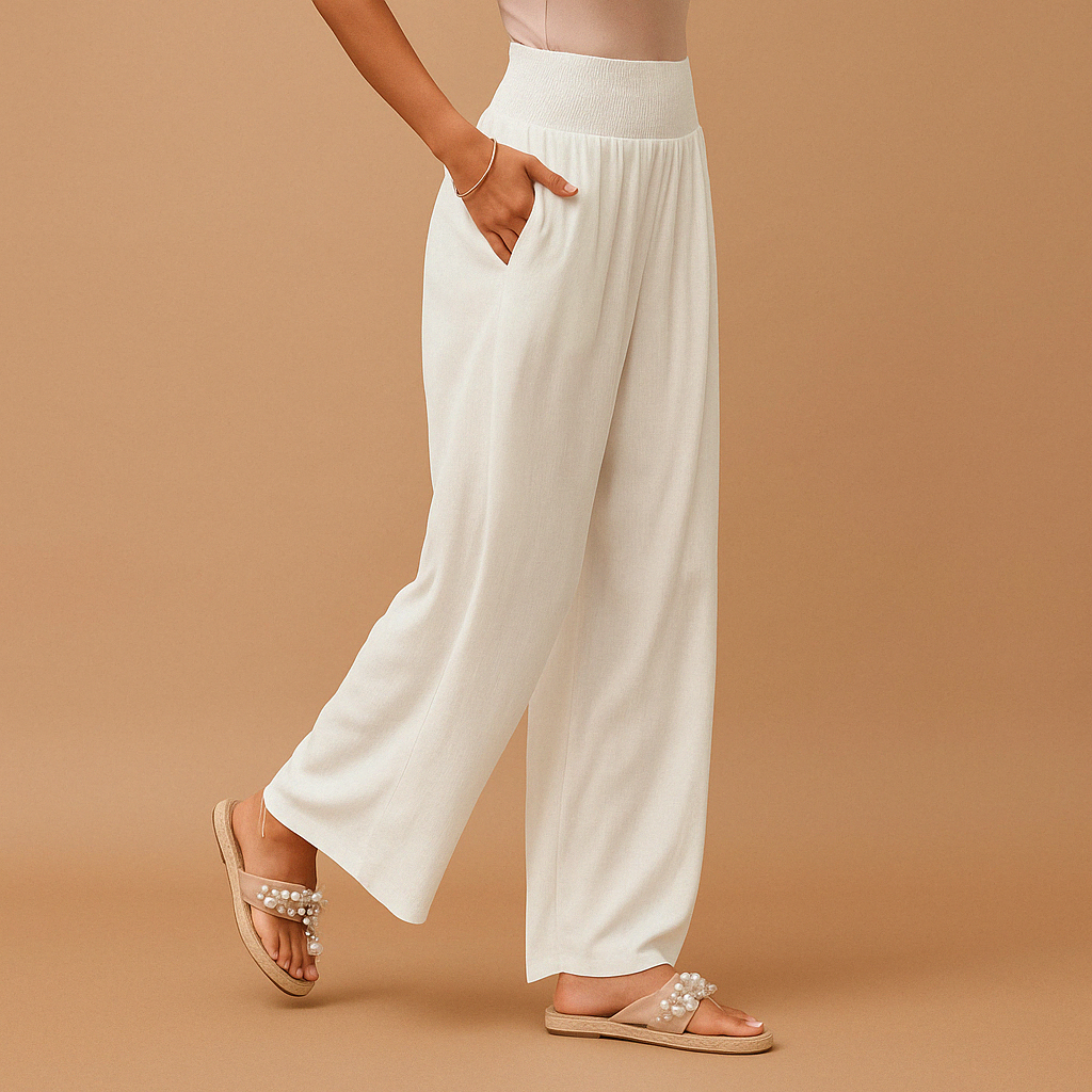 Women’s breathable summer trousers with elastic waistband and loose straight legs, perfect for warm weather, casual outings, or relaxed days at home.