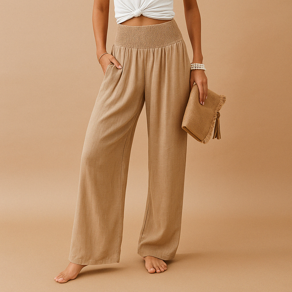 Women’s breathable summer trousers with elastic waistband and loose straight legs, perfect for warm weather, casual outings, or relaxed days at home.