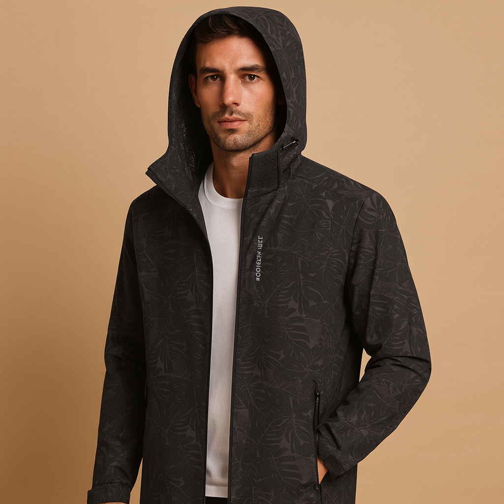 Men’s waterproof outdoor jacket with subtle leaf pattern, adjustable hood, and zippered pockets for everyday and outdoor wear.