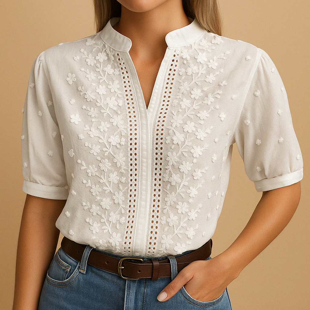 White elegant blouse for women with a classic collar and button-down front, ideal for work or casual outfits.