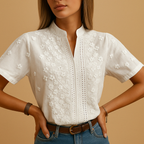 White elegant blouse for women with a classic collar and button-down front, ideal for work or casual outfits.
