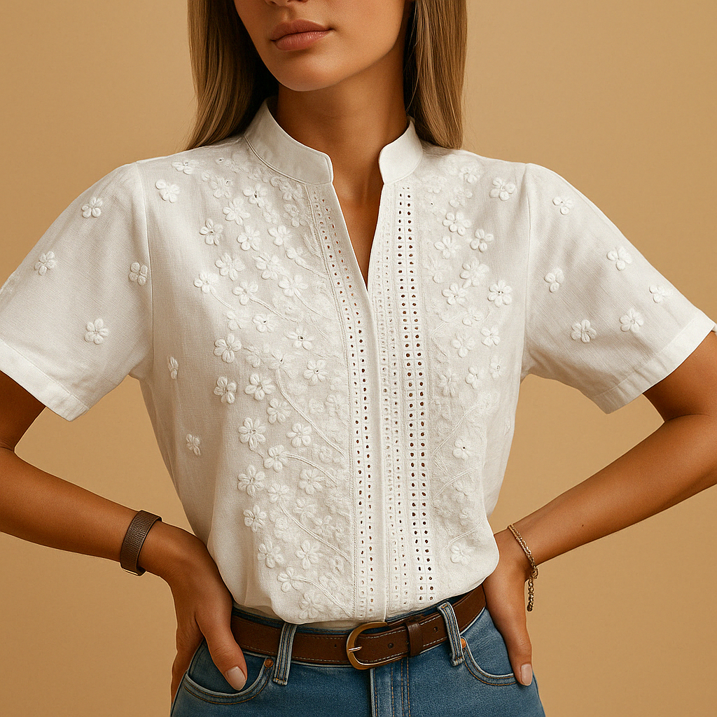 White elegant blouse for women with a classic collar and button-down front, ideal for work or casual outfits.